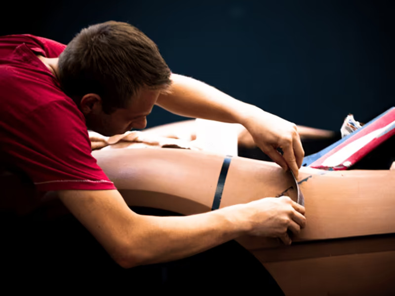 Ferrari engineer working on engine